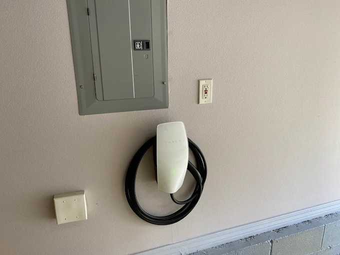DFS Electric Tesla Gen 3 EV charger installation in a residential garage, Tallahassee FL